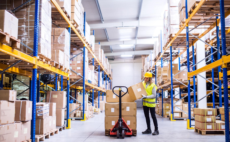 Warehouse forklift moving cargo
